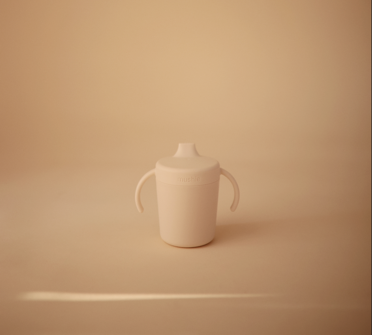 mushie tuitbeker sippy cup tuitje drinkbeker zuigen handvaten goed vasthouden siliconen wit ivory korting almelo twente